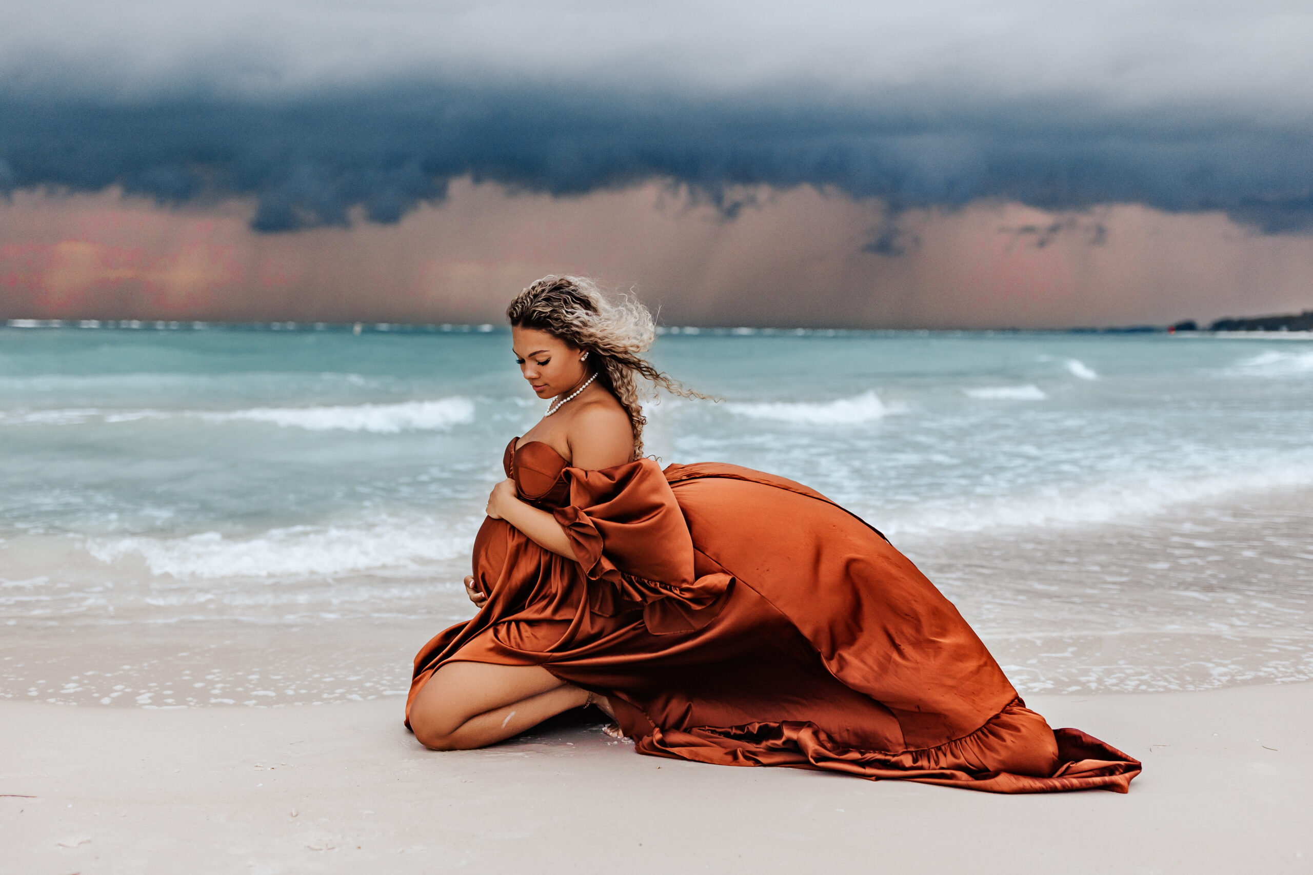 stormy maternity photoshoot on Anna Maria island